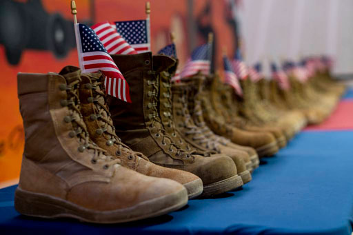 Airmen from the 332nd Air Expeditionary Wing honored veterans who take their own lives, symbolized by pairs of boots, in recognition of Suicide Prevention Month during an event on Sept. 8, 2021.
