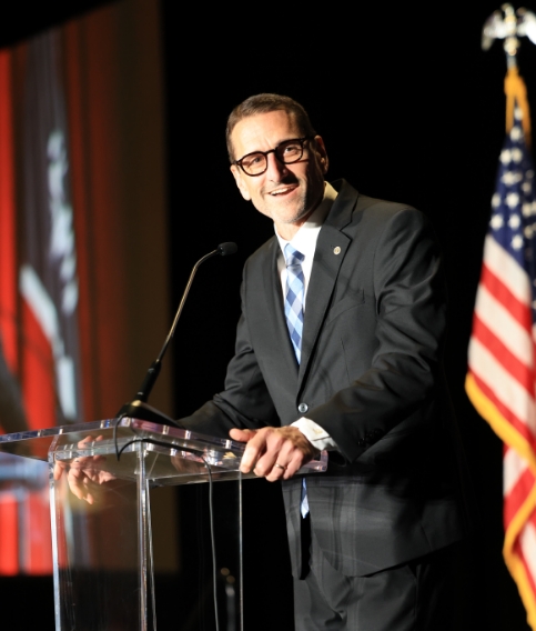 Jeremy Stalnecker speaking to audience at Mighty Oaks Warrior Gala